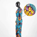 Damen Set aus gewachstem Baumwoll-Crop-Top mit langen Ärmeln und Hose mit weitem Bein