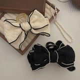 Der "Ethereal Bow" Grip Clip: Fortschrittliche Sensation Schmetterlingsknoten