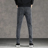 Herren hochelastische schmale Jeans – vertikal gestreifte Denim-Hose
