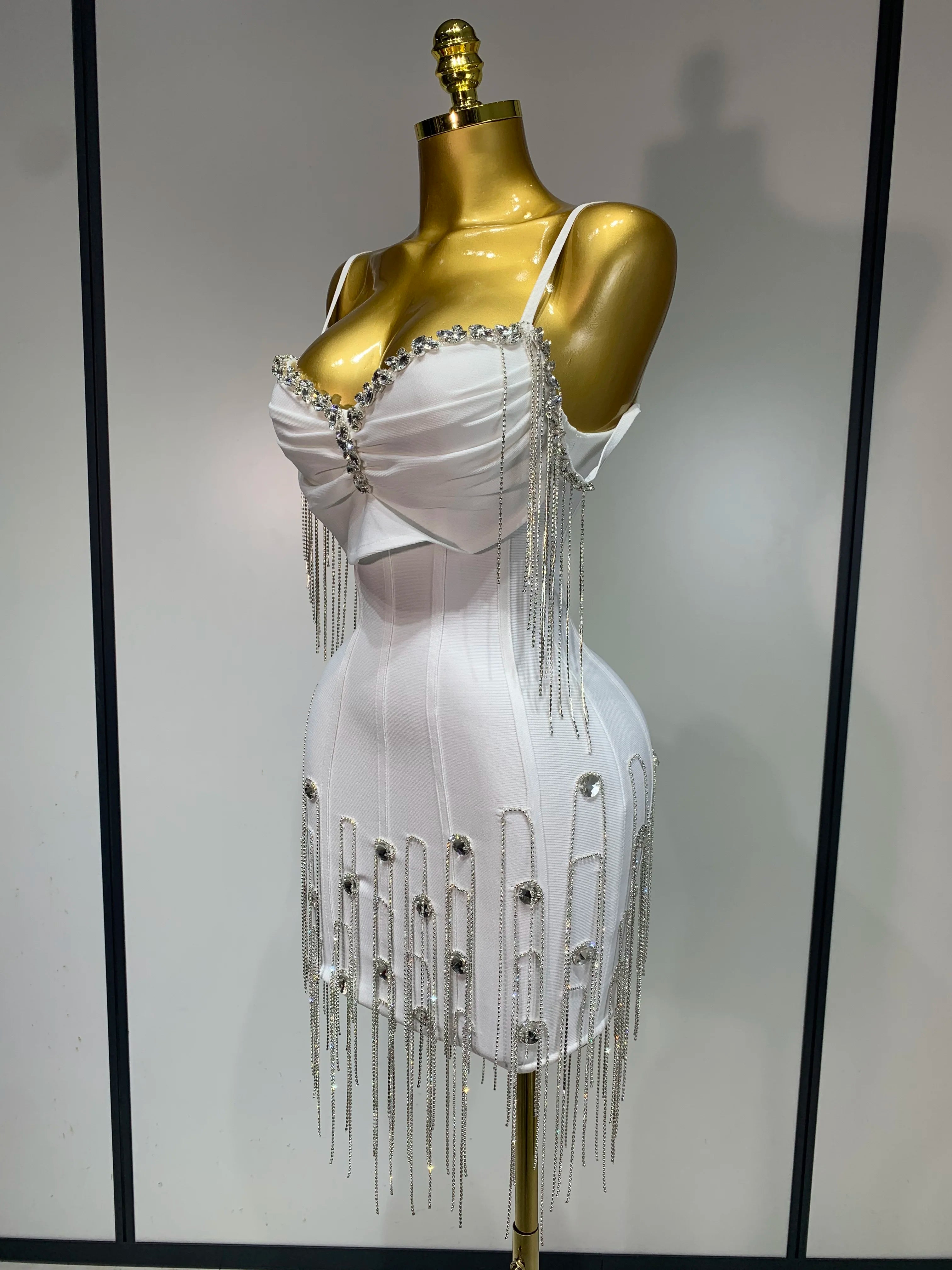 Command attention in this ultra-flattering and sexy backless bodycon dress. Designed with a high-stretch bandage material for a flawless silhouette, this mini dress is the ultimate choice for prom after-parties, club nights, glamorous birthdays, and any event where you want to feel confident and chic.