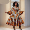 Das Maxi-Kleid "Aura": Kühnes afrikanisches Print-Kleid mit dramatischen ausgestellten Ärmeln