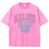 Das Malibu Retro T-Shirt: Sun-Washed Baumwoll-Grafik-T-Shirt mit Vintage-Schriftzug