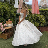 Geblümtes Midi-Sommerkleid – Elegantes Spaghettiträger-Kleid mit fließendem Schnitt