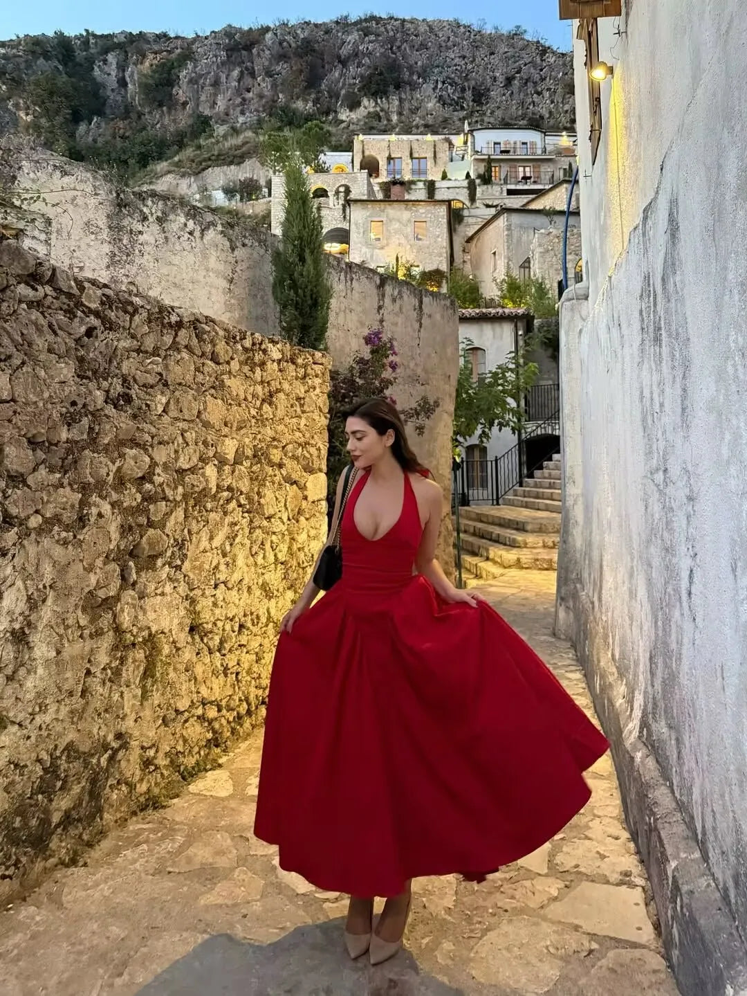 The "Aura Cotton" Midi: A Daring Backless Halter with a Seductive Low-Waist A-Line Flare
