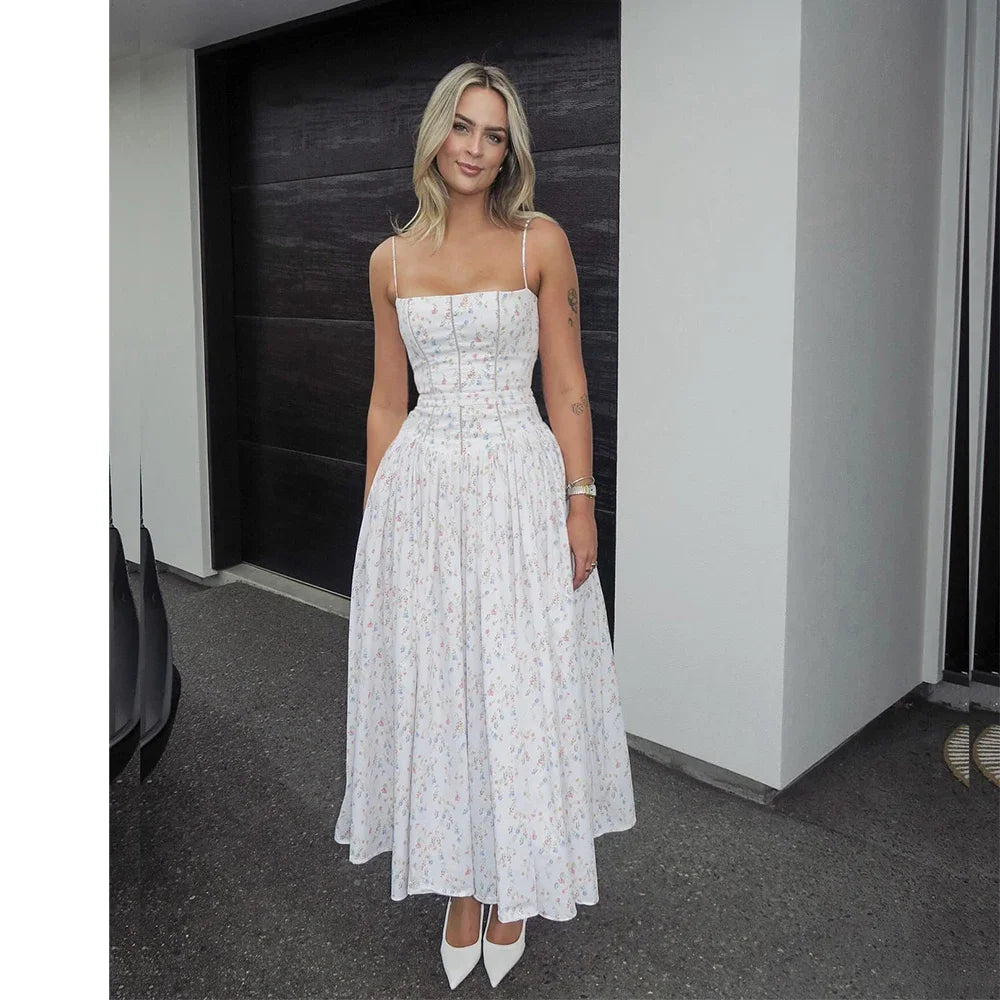 Geblümtes Midi-Sommerkleid – Elegantes Spaghettiträger-Kleid mit fließendem Schnitt