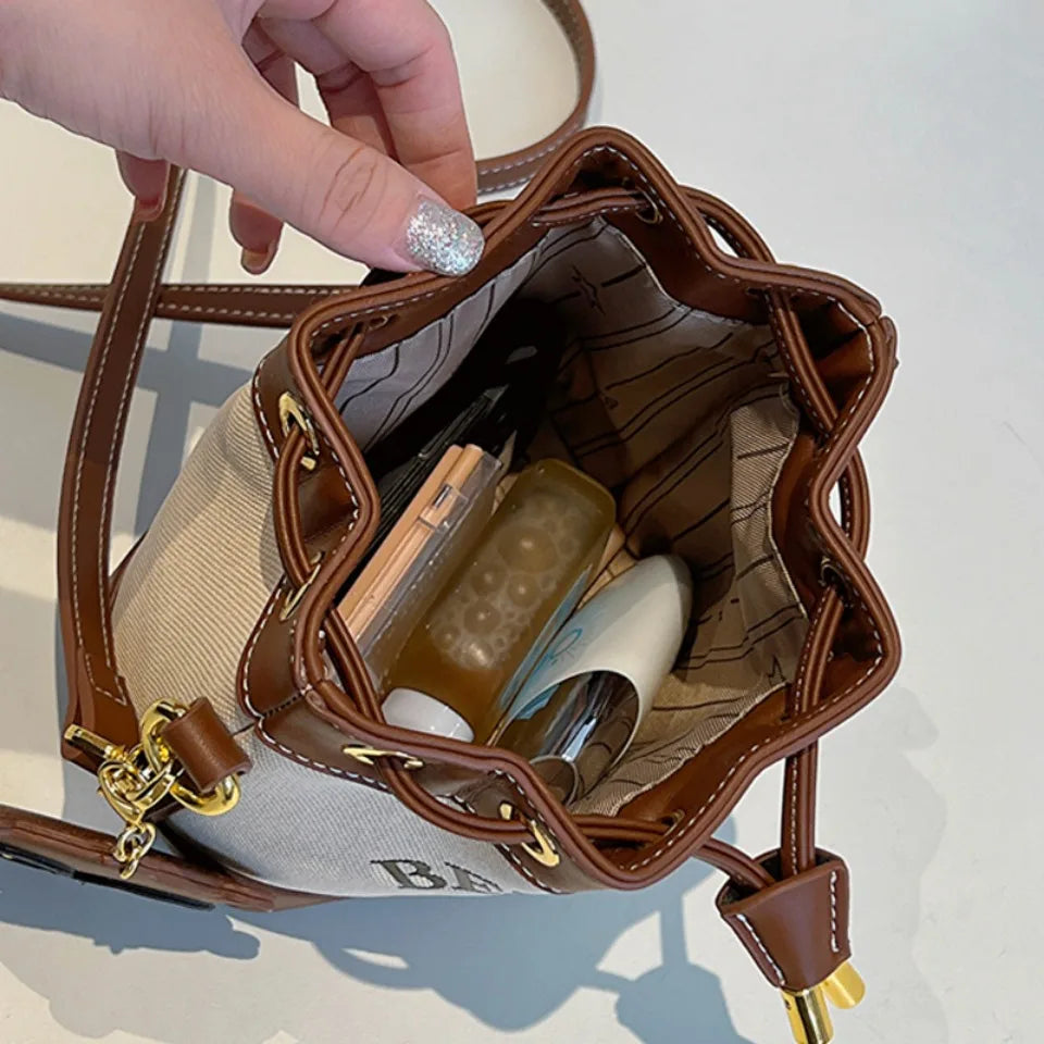 Die Urban-Flow Eimertasche Großraum-Handtasche/Messenger-Bag