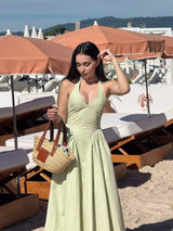 The "Aura Cotton" Midi: A Daring Backless Halter with a Seductive Low-Waist A-Line Flare