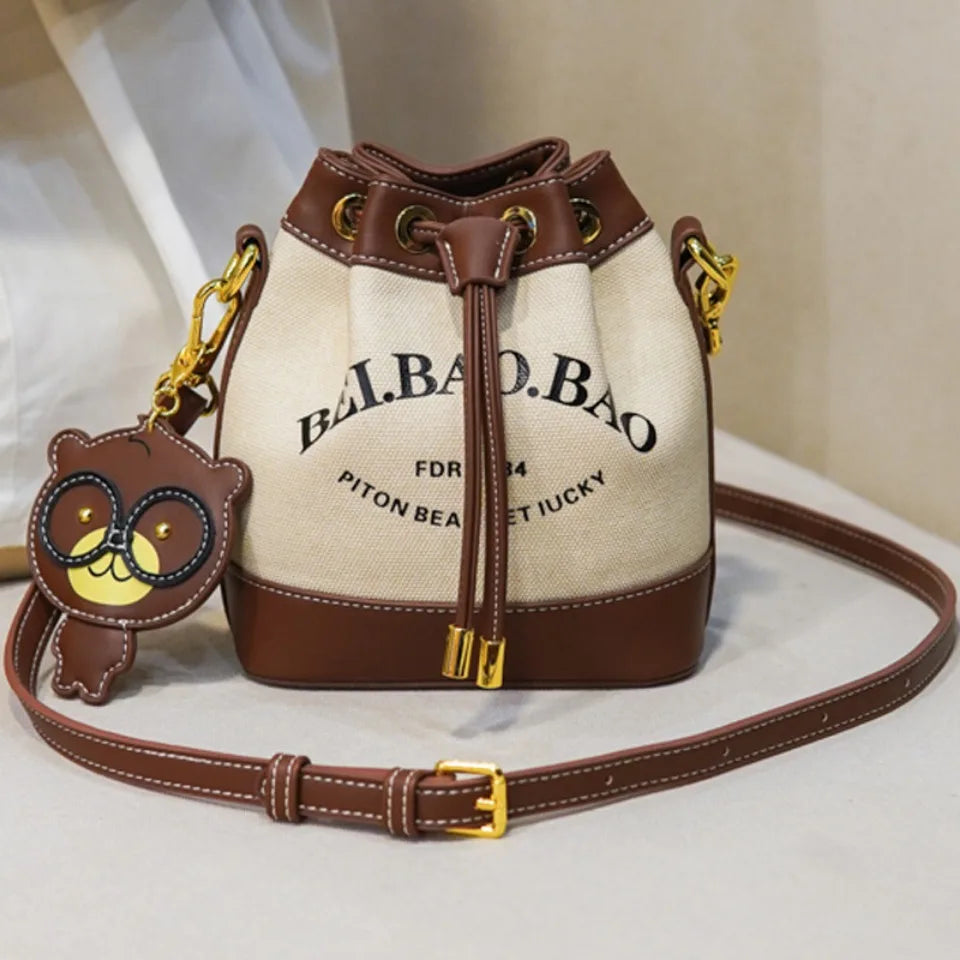 Die Urban-Flow Eimertasche Großraum-Handtasche/Messenger-Bag