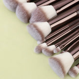 The "Artisan-Touch" 11-Piece Set: Solid Wood Makeup Brush Collection with Travel Bag