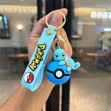 Pokémon Pokéball Schlüsselanhänger-Set mit Figuren – Pikachu, Evoli & Glumanda Schlüsselanhänger