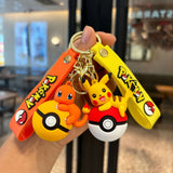 Pokémon Pokéball Schlüsselanhänger-Set mit Figuren – Pikachu, Evoli & Glumanda Schlüsselanhänger