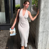 Elegantes langes Damenkleid mit Polka Dots und Neckholder – sexy, trägerloses, rückenfreies Schnürkleid