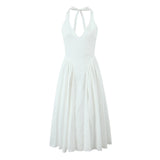 Das „Aura Cotton“ Midi-Kleid: Ein gewagtes Neckholder-Kleid mit tiefem Rückenausschnitt und einem verführerischen A-Linien-Rock mit niedriger Taille