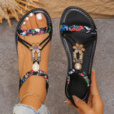 Damen-Flachsandalen im Ethno-Stil mit runder Zehenpartie, Perlenbesatz und Knöchelriemen im Bohemian-Stil