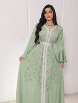 Die „Emerald“ Royal Abaya: Atemberaubendes türkisches Gewand mit Diamantakzenten und aufwendigem Spitzenband