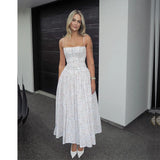 Geblümtes Midi-Sommerkleid – Elegantes Spaghettiträger-Kleid mit fließendem Schnitt