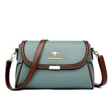 Die Petite-Luxe Silhouette einfarbige Handtasche aus hochwertigem Leder