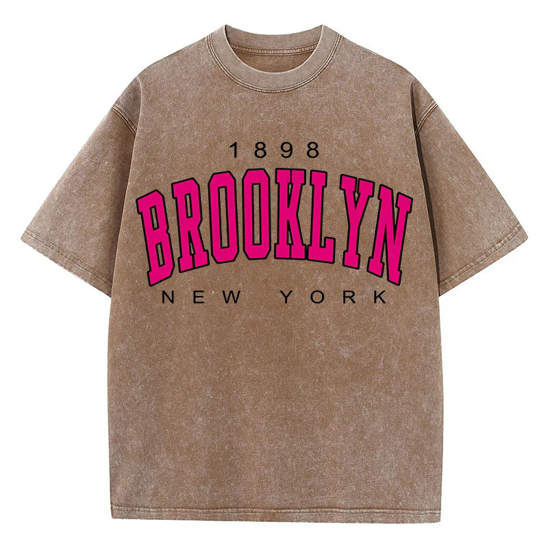 The Brooklyn Heritage Tee: Women's Washed Cotton Oversized Top with Vintage New York Typography
