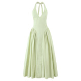 Das „Aura Cotton“ Midi-Kleid: Ein gewagtes Neckholder-Kleid mit tiefem Rückenausschnitt und einem verführerischen A-Linien-Rock mit niedriger Taille